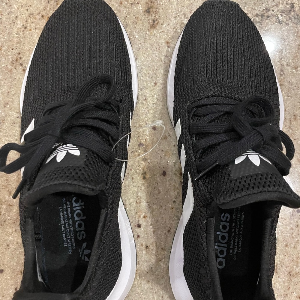 These shoes have never been worn. Stickers on the bottom were the original tags.